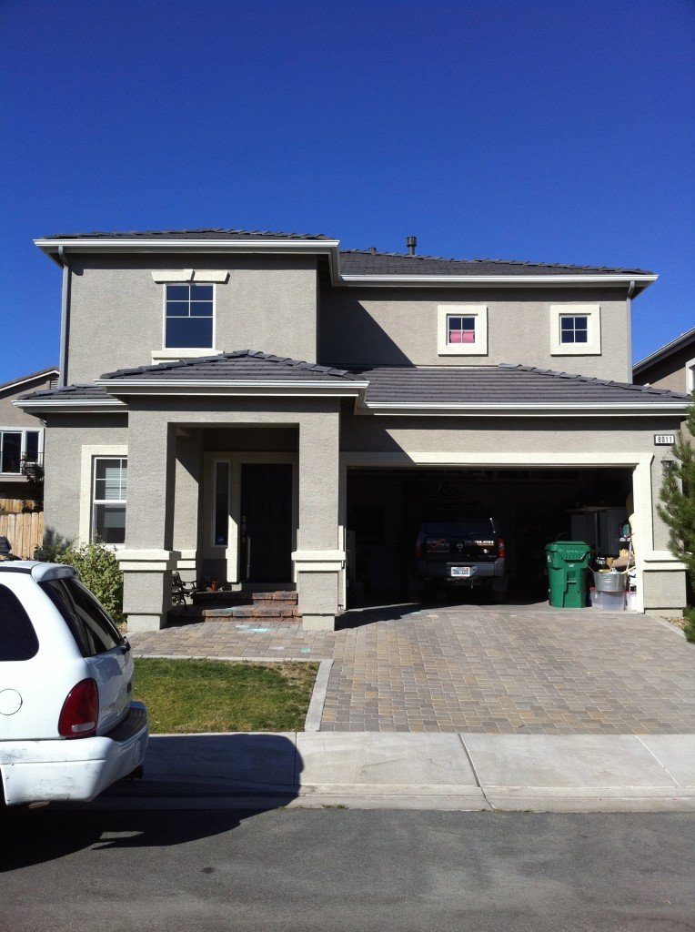 Seamless gutter installation in progress by Gutter Brothers crew